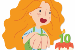 Zoé, la petite fille qui incarne COCITER, fête les 10 ans de fourniture de la coopérative en soufflant une bougie sur un gâteau.